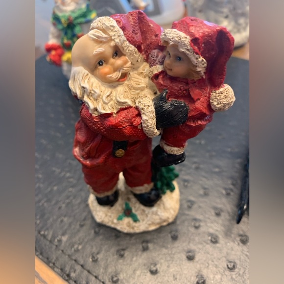 SANTA HOLDING A SMALL CHILD ORNAMENT - Picture 1 of 4